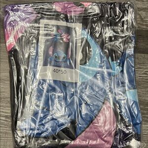 Source Unknown Blue and Pink Character Blanket